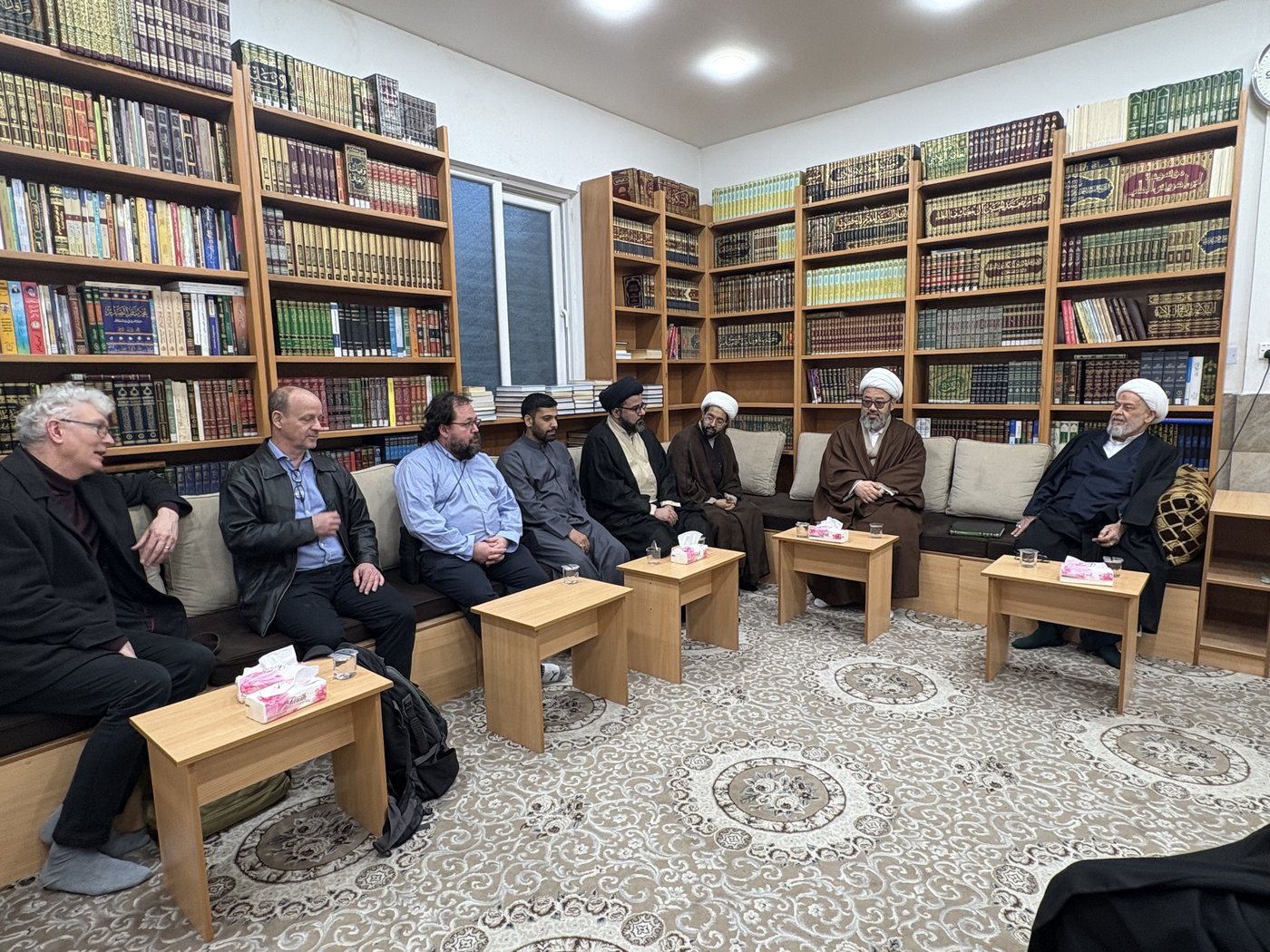An audience with Ayatollah Muhammad Hadi al-Radi in his library, Najaf.