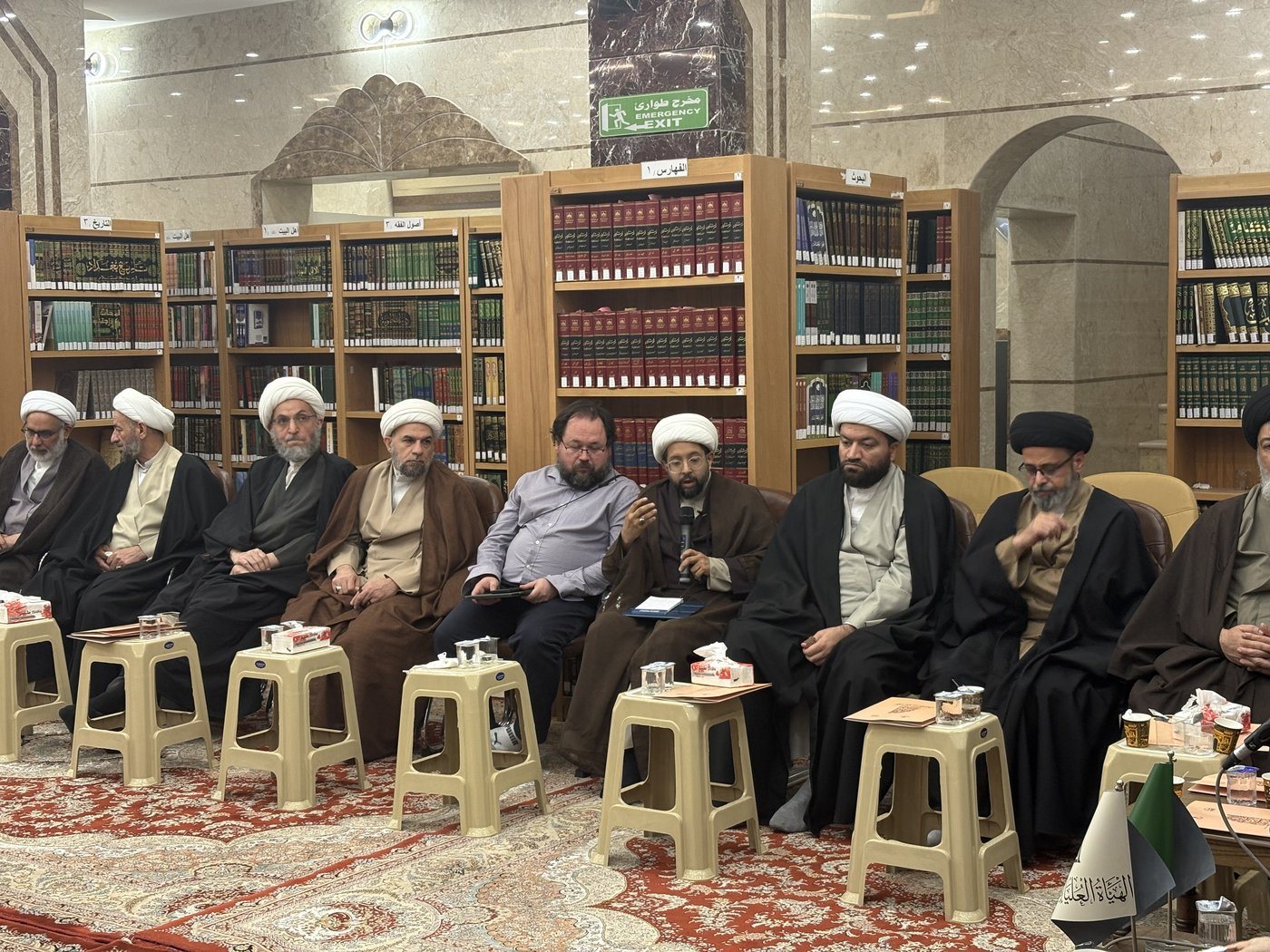 Dr. Hewko listens during the dialogue session with Najaf scholars in the hawza library.