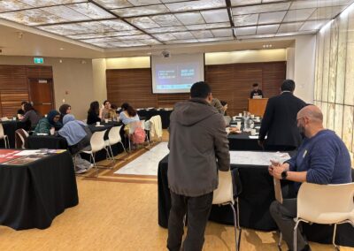Guests seated at tables during the welcome to Interfaith Encounters: A Taste of Islamic Shi'a Life at the Multi-Faith Centre